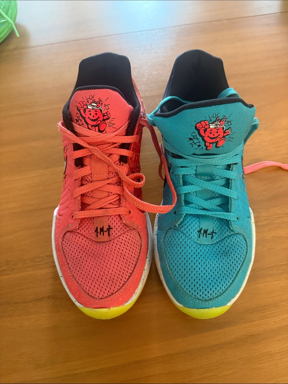 Nike Kids Mismatched Pink & Teal Sneakers with Character Graphic